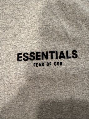 Fear of God ESSENTIALS Light Gray Crewneck Sweatshirt with Black Logo